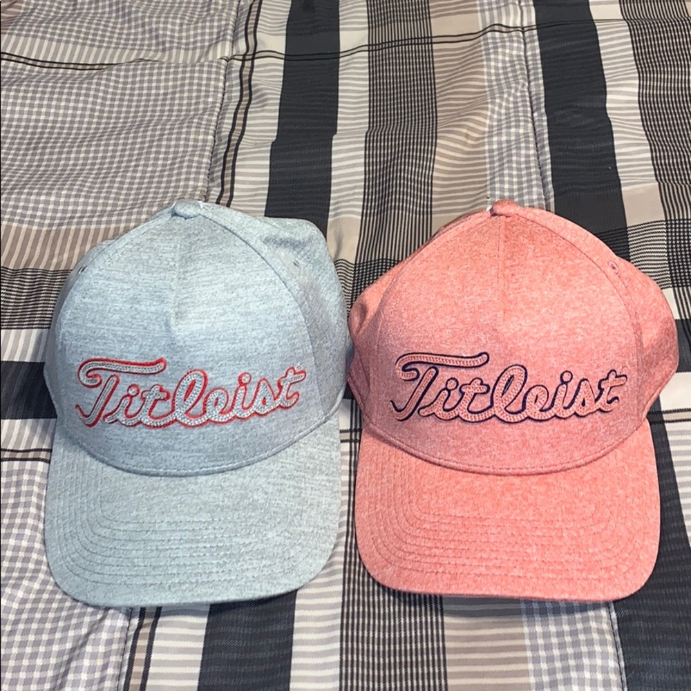 Two Titleist hats